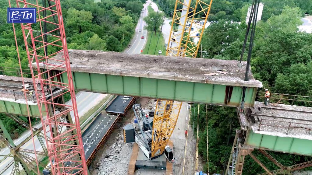 bridge repair heavy construction documentation aerial photo of bridge span being removed and replaced | P-Tn