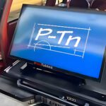 wide screen large format screen in back of truck with P-Tn logo displayed | P-Tn