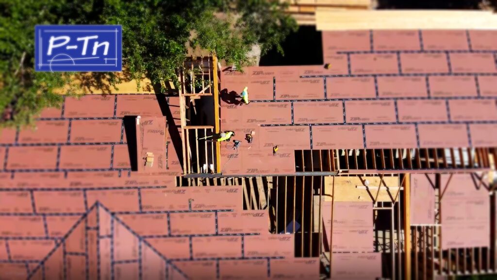 roofers working on residential roof | P-Tn