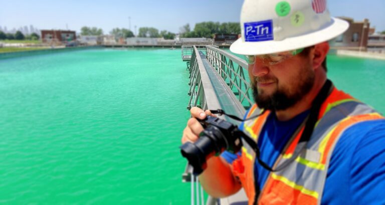 photographer taking photos at water treatment plant